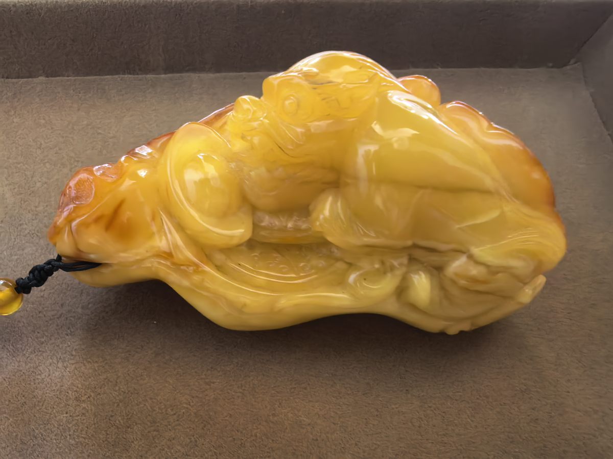 Old Beeswax Amber Beast Pendant