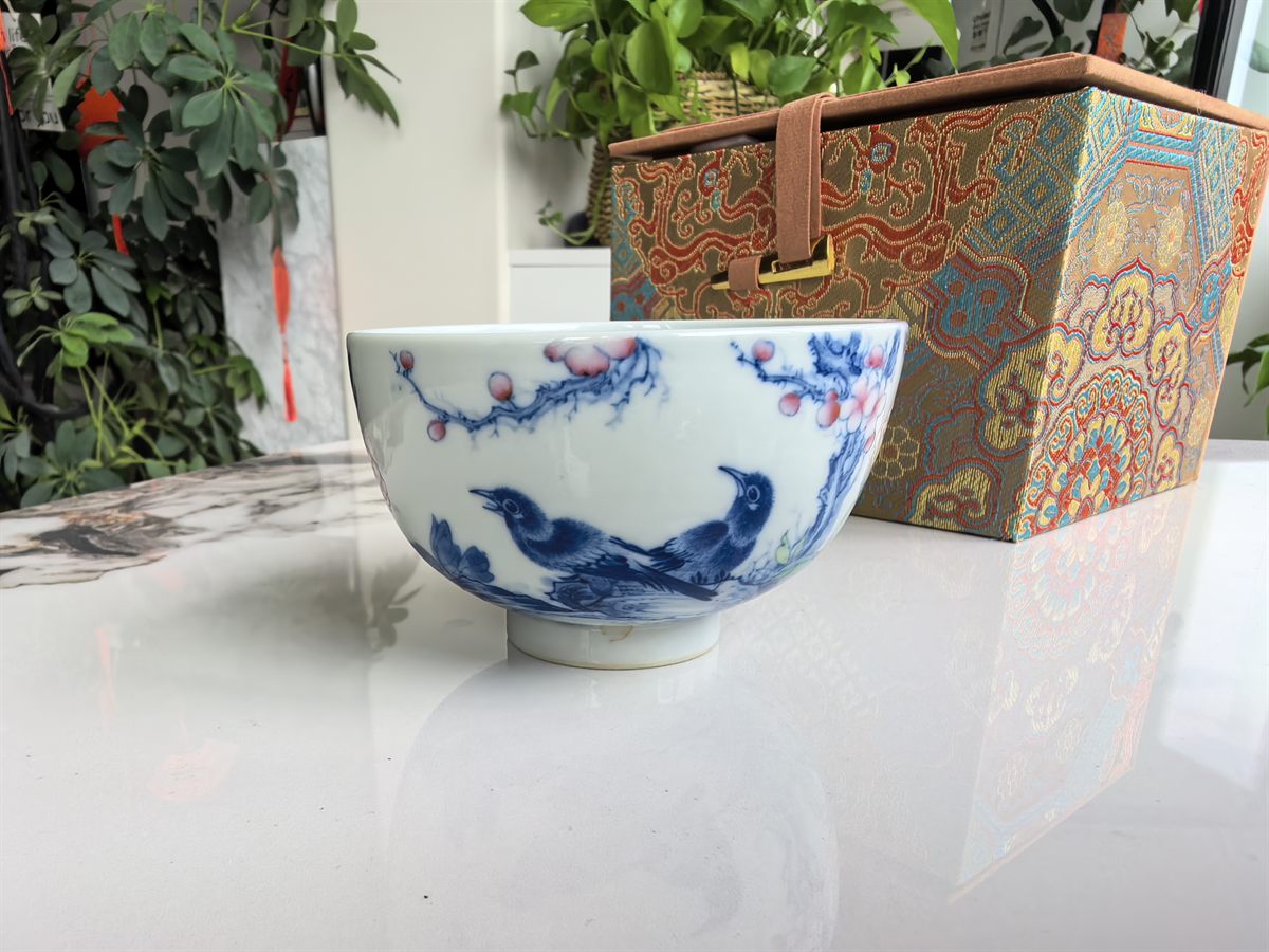 Blue-and-White Teacup with Magpies and Peach Branches